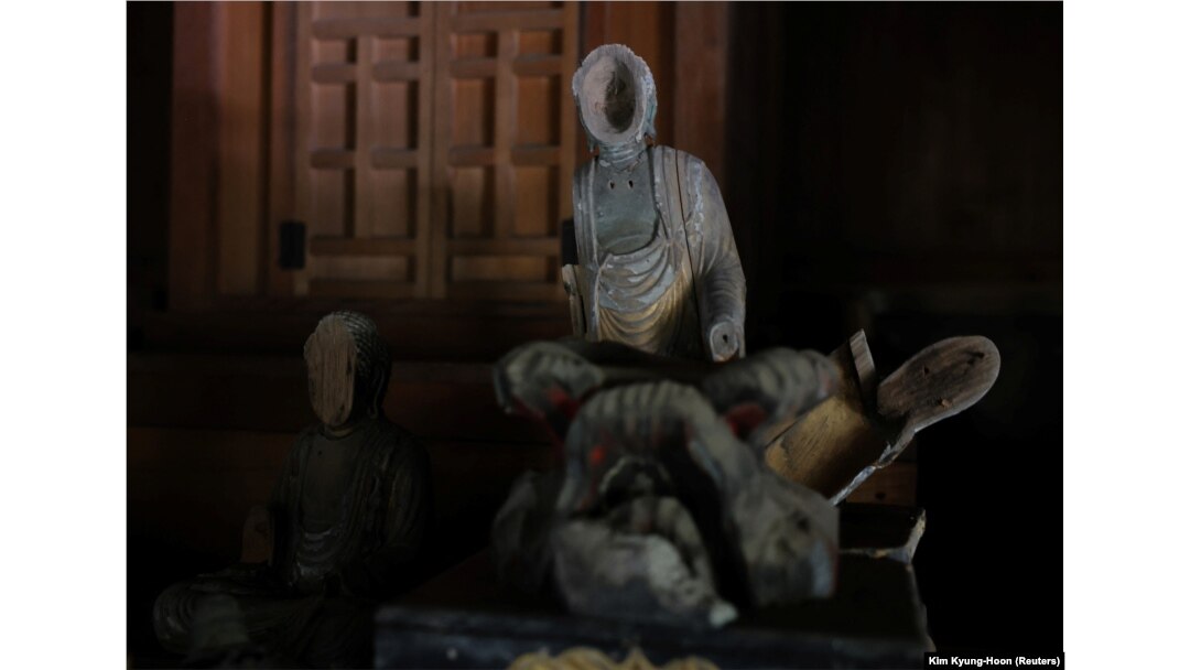 Broken Buddha statues are pictured at the Mikaboyama Fudoson temple in Fujioka, Gunma Prefecture, Japan September 4, 2024. (REUTERS/Kim Kyung-Hoon)