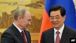 روس کے صدر کی چینی ہم منصب سے ملاقات (فائل فوٹو)