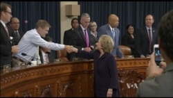 Clinton Offers Forceful Defense at Benghazi Hearing