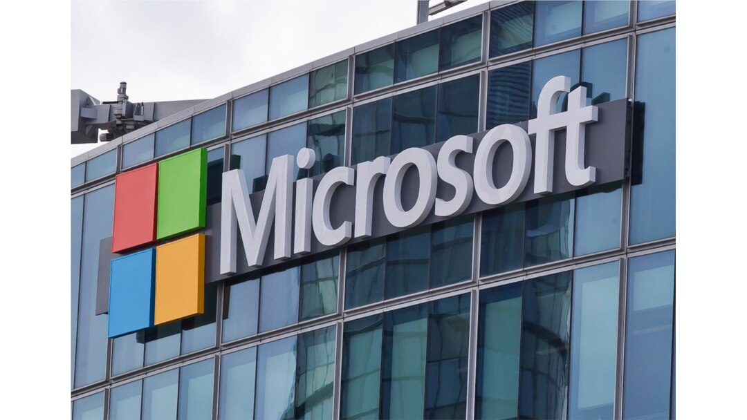 FILE - This April 12, 2016 file photo shows the Microsoft logo in Issy-les-Moulineaux, outside Paris, France.