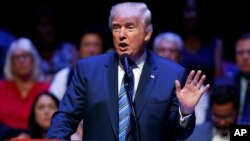 Republican presidential candidate Donald Trump speaks during a campaign rally at Merrill Auditorium, Aug. 4, 2016, in Portland, Maine. 