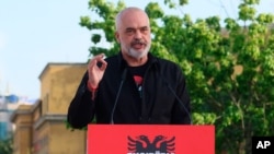 Albania's Prime Minister Edi Rama speaks to his supporters during a rally in Tirana, Albania, April 27, 2021.