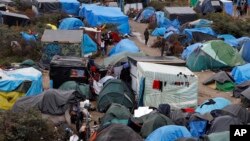 This camp in the Calais area of northern France holds about 6,000 migrants who are fleeing war, political turmoil and poverty outside Europe and are hoping to find better lives in Britain..