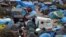 This camp in the Calais area of northern France holds about 6,000 migrants who are fleeing war, political turmoil and poverty outside Europe and are hoping to find better lives in Britain..