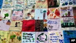 Children worldwide designed 'pledge patches,' depicting how they promise to work on environmental stewardship.
