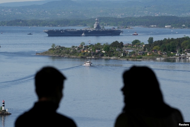 A view of the U.S. aircraft carrier USS Gerald R. Ford in the Oslo Fjord, seen from Ekebergskrenten, Norway, May 24, 2023. (Javad Parsa/NTB/via REUTERS)