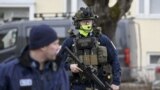 Finnish police officers investigate at the primary Viertola comprehensive school after a 12-year-old child died and two others seriously wounded when a child opened fire at a school, on April 2, 2024 in Vantaa, outside the Finnish capital Helsinki.