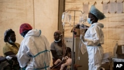 Health workers treat cholera patients at the Bwaila Hospital in Lilongwe, Malawi, on Jan. 11, 2023.