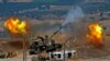 Tirs d'obus israéliens tirent en direction du Liban depuis une position située près de la ville de Kiryat Shmona, dans le nord d'Israël, suite à des tirs de roquettes depuis le côté libanais de la frontière, le 6 août 2021.