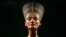FILE - The Nefertiti bust is pictured during a press preview of the exhibition 'In The Light Of Amarna' at the Neues Museum in Berlin, Germany, due to the 100th anniversary of the discovery of the famous sculpture of the ancient Egyptian queen Nefertiti. 