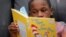 Michael Crowder, 11, reads during an after-school literacy program in Atlanta on Thursday, April 6, 2023. (AP Photo/Alex Slitz)