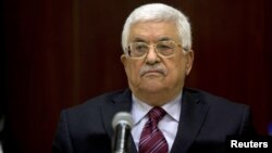 FILE - Palestinian President Mahmoud Abbas chairs a Palestinian Liberation Organization (PLO) executive committee meeting in the West Bank city of Ramallah, Aug. 22, 2015.