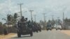 A military convoy of South Africa National Defense Forces patrols in Pemba, Aug. 5, 2021. The Southern African Development Community bloc is rallying behind neighboring Mozambique, sending troops to battle jihadists wreaking havoc in the north.