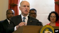 California Gov. Jerry Brown discusses climate change at a news conference, June 13, 2017, in Sacramento, California. During the event Fiji Prime Minister Frank Bainimarama, the incoming president of the U.N. Climate Change Conference, named Brown to be a special advisor. 