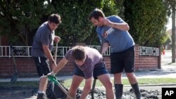 Student volunteers assisting in post-quake clean-up efforts in Christchurch, February 27, 2011