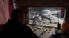 A worker controls extraction of ilmenite, a key element used to produce titanium, in an open pit mine in the central region of Kirovohrad, Ukraine, Feb. 12, 2025. 