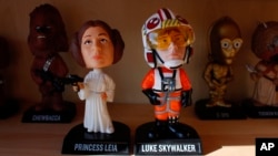 Bobbleheads from the "Star Wars" movies are displayed at National Bobblehead Hall of Fame and Museum in Milwaukee, Jan. 8, 2019. 