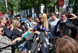 The physician treating Russian opposition leader Alexei Navalny, Dr. Anastasiya Vasilyeva speaks to journalists at a hospital after Navalny was discharged, in Moscow, Russia, July 29, 2019.
