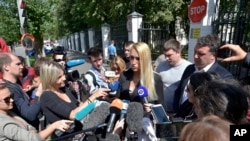 The physician treating Russian opposition leader Alexei Navalny, Dr. Anastasiya Vasilyeva speaks to journalists at a hospital after Navalny was discharged, in Moscow, Russia, July 29, 2019.
