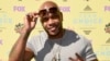 FILE - Flo Rida arrives at the Teen Choice Awards at the Galen Center in Los Angeles. 