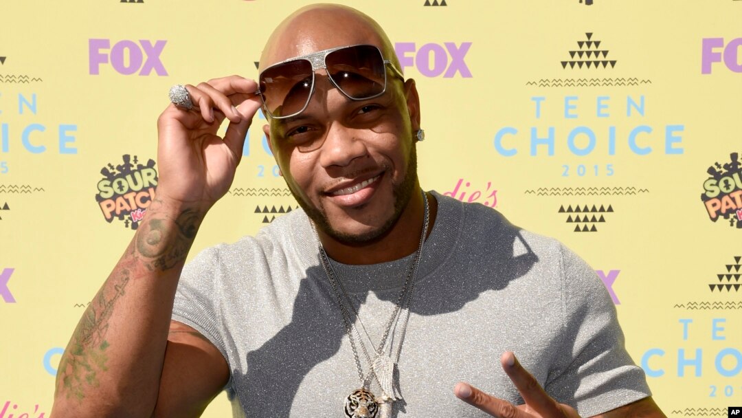 FILE - Flo Rida arrives at the Teen Choice Awards at the Galen Center in Los Angeles. 