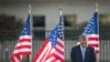 President Barack Obama bows his head during a moment of silence at the Pentagon during a ceremony to mark the 13th anniversary of the 9/11 attacks, Sept. 11, 2014.