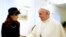 Argentine President Cristina Fernandez shakes hands with newly elected Pope Francis during a private meeting at the Vatican March 18, 2013. 