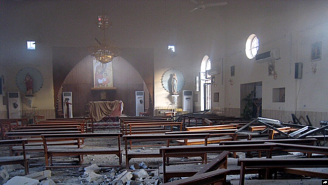 The damaged interior of the Holy Family Syrian Catholic Church after an early morning car bomb attack in Kirkuk, 290 kilometers (180 miles) north of Baghdad, August 2, 2011