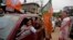 Bharatiya Janata Party (BJP) supporters celebrate their party's win in state assembly elections in Gauhati, Assam state, India, May 19, 2016. India's ruling Hindu nationalist party made dramatic gains in elections in the eastern state.