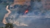 A fire blazes on the Israeli side of the Israel-Lebanon border following attacks from Lebanon, amid cross-border hostilities between Hezbollah and Israeli forces, in northern Israel, June 18, 2024.