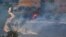 A fire blazes on the Israeli side of the Israel-Lebanon border following attacks from Lebanon, amid cross-border hostilities between Hezbollah and Israeli forces, in northern Israel, June 18, 2024.