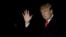 U.S. President Donald Trump waves as he walks on South Lawn of the White House upon his return to Washington, from France, Nov. 11, 2018. 