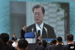 FILE - South Korean President Moon Jae-in speaks in Gwangju, South Korea, May 18, 2020.