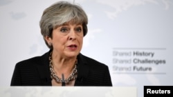 Britain's Prime Minister Theresa May gives a speech in Complesso Santa Maria Novella, Florence, Italy, Sept. 22, 2017. 