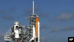 Space Shuttle Discovery sits on its launch pad in Cape Canaveral, Florida, 24 Oct 2010