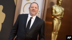 FILE - Harvey Weinstein arrives at the Oscars at the Dolby Theatre in Los Angeles, March 2, 2014.