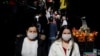  People wear protective face masks due to coronavirus concerns in Istanbul, Turkey March 13, 2020. 