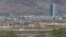 FILE - The Kaesong industrial complex in North Korea is seen from the Taesungdong freedom village inside the demilitarized zone during a press tour in Paju, South Korea, April 24, 201,. The rival Koreas have opened their first liaison office near their tense border to facilitate better communication and exchanges.