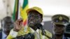 Zimbabwe's President Robert Mugabe addresses supporters at the elective congress in Harare, Zimbabwe, Dec. 4, 2014.