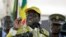 FILE - Zimbabwean President Robert Mugabe is seen addressing supporters in Harare, Zimbabwe, Dec. 4, 2014.