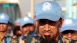 Bangladeshi police officers from the U.N. operation queue as they arrive in South Sudan international airport in Juba December 31, 2013. The Bangladeshi officers, who are trained in crowd management and security, will be deployed to help manage the growing population of displaced civilians sheltering in compounds throughout the country, according to the United Nations Mission in South Sudan (UNMISS). REUTERS/James Akena (SOUTH SUDAN - Tags: POLITICS MILITARY CIVIL UNREST) - RTX16Y60