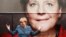 German Chancellor Angela Merkel and leader of the Christian Democratic Union party CDU stands in front of her election campaign tour bus before a CDU board meeting in Berlin, Sept. 16, 2013.