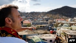 France's President Emmanuel Macron visits the Kavani district in Mamoudzou, on the French Indian Ocean territory of Mayotte on Dec. 19, 2024, following Cyclone Chido's passage over the archipelago.