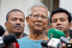 FILE- Muhammad Yunus speaks to reporters in Dhaka, Bangladesh, March 3, 2024.