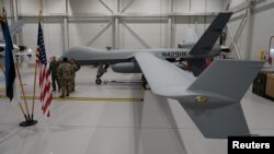 ARCHIVES - Un drone MQ-9 Reaper de l'armée de l'air américaine dans un hangar de la base aérienne d'Amari, en Estonie, le 1er juillet 2020.