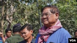 FILE PHOTO- Interior Minister Sar Kheng oversees the rescue operation after a building collapsed in Kep province, Cambodia, January 4, 2020. (Sun Narin/VOA Khmer) 