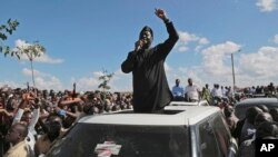 FILE - Kenyan opposition leader Raila Odinga addresses supporters in Nairobi, Kenya, Nov. 28, 2017.