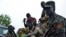 FILE - South Sudanese SPLA soldiers are pictured in Pageri in Eastern Equatoria state, Aug. 20, 2015. The United Nations refugee agency, Feb. 12, 2019, says a surge of violence in Equatoria State has displaced thousands fleeing to the Democratic Republic of Congo.