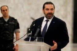 FILE - Saad Hariri, who quit as Lebanon's prime minister on Oct. 29, speaks after meeting President Michel Aoun at the presidential palace in Baabda, Lebanon, Nov. 7, 2019.