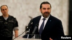 FILE - Saad al-Hariri, who quit as Lebanon's prime minister on Oct. 29, speaks after meeting President Michel Aoun at the presidential palace in Baabda, Lebanon, Nov. 7, 2019. 